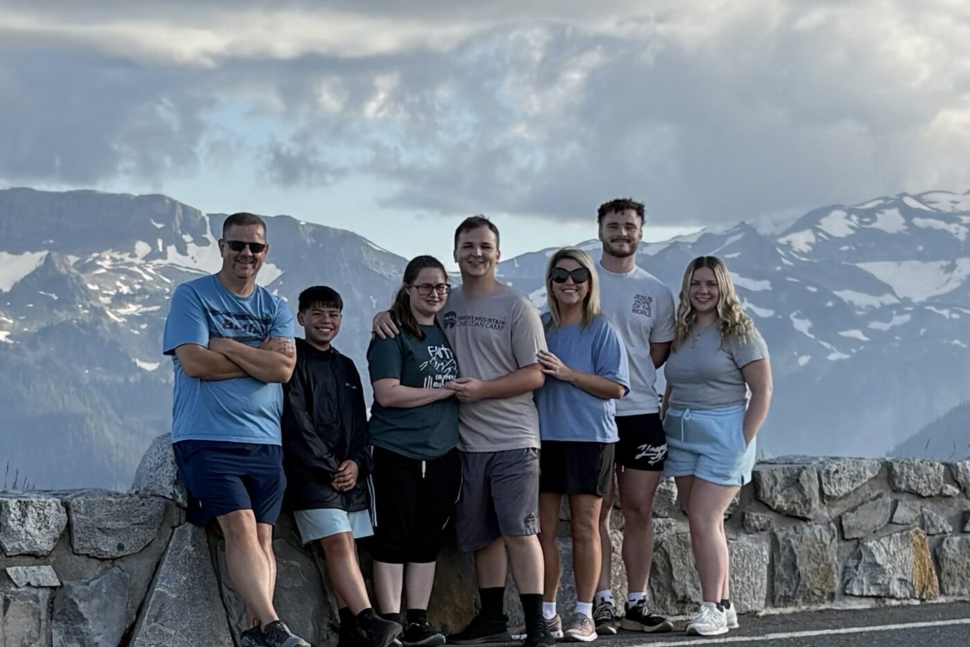 Caleb with family in the mountains
